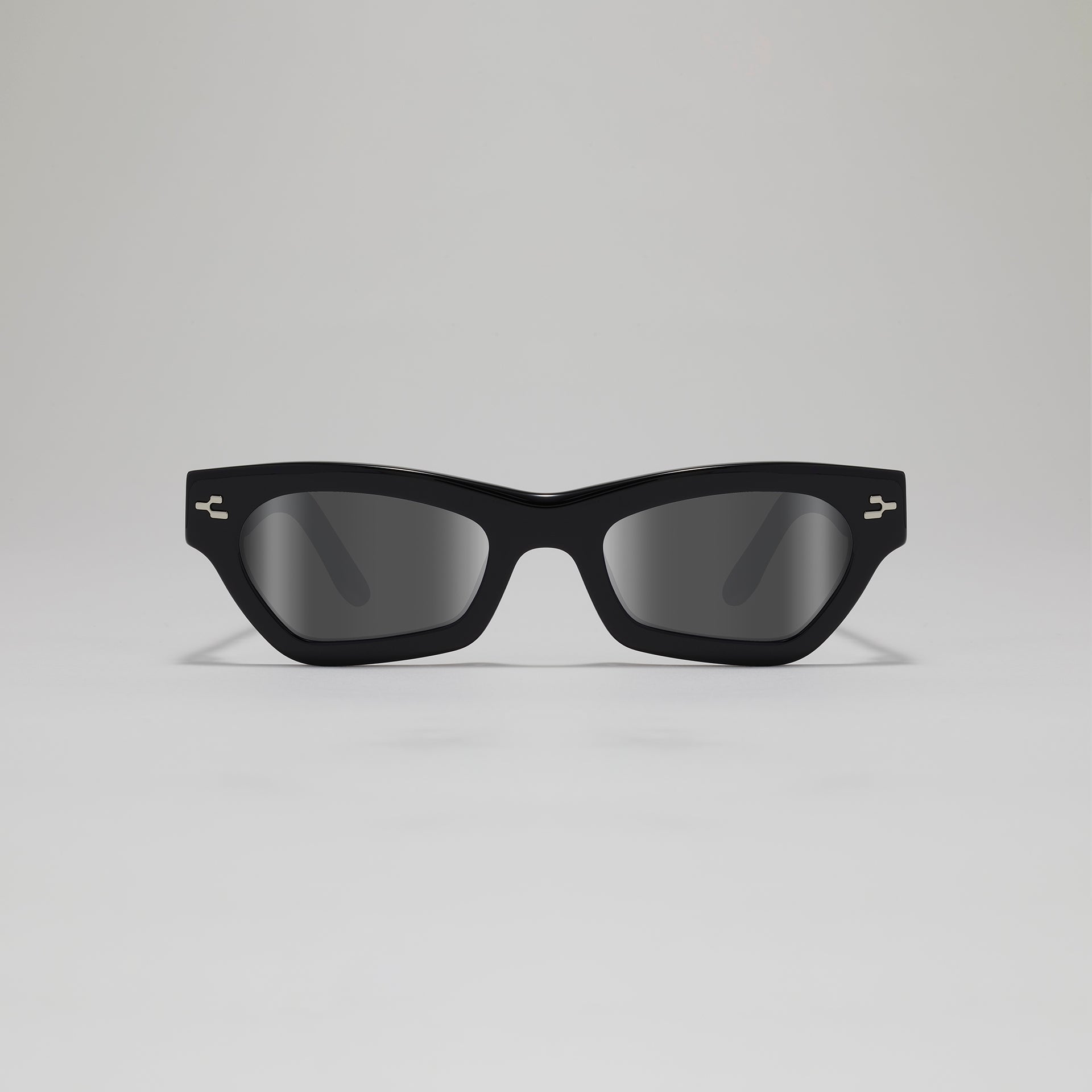 Black sunglasses with a gray background