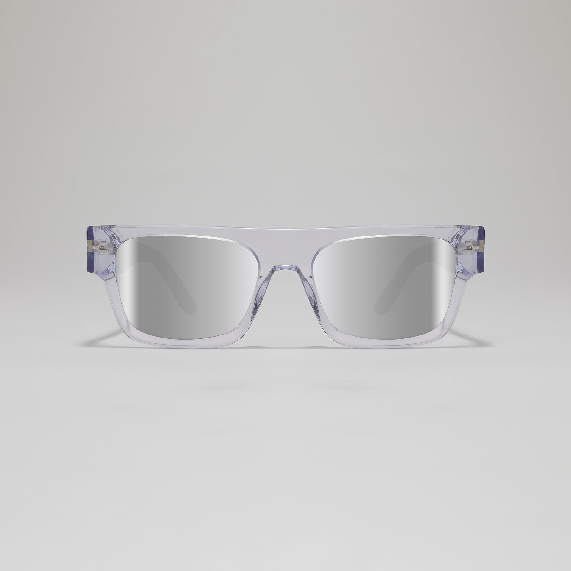 Sunglasses with floral patterned arms on a light gray background