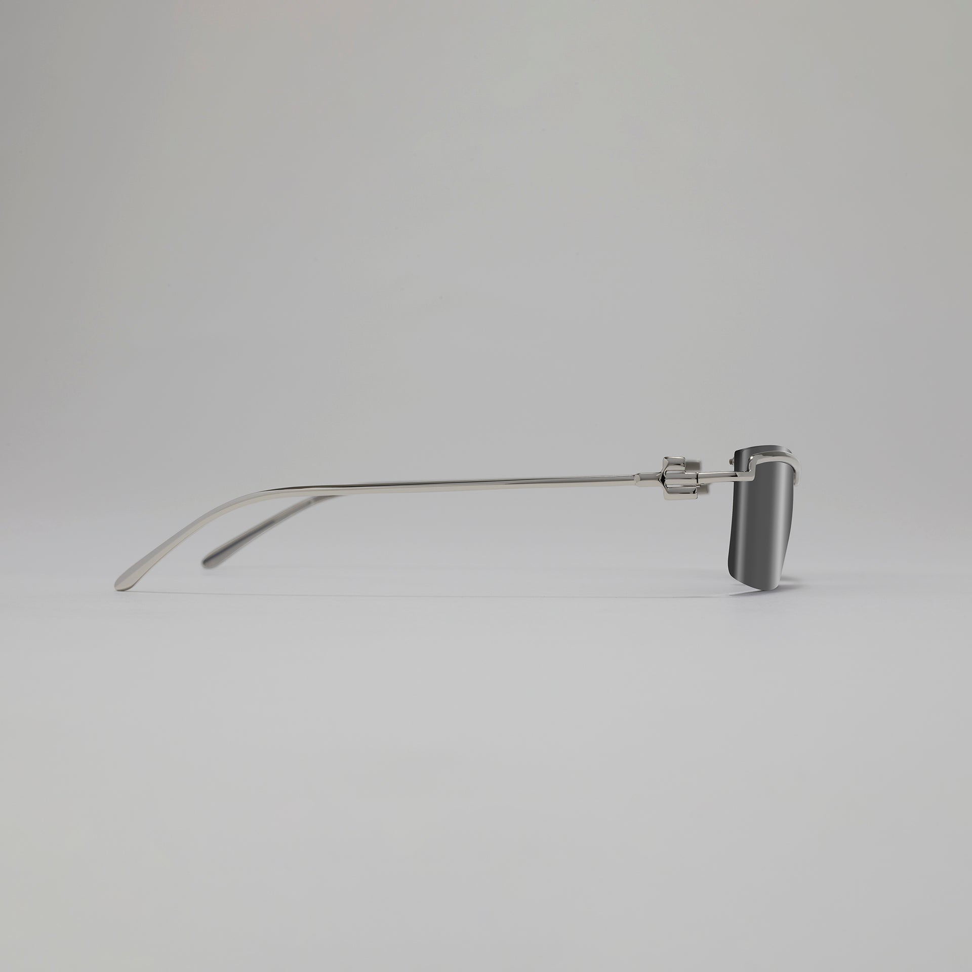 Metallic object on a gray background