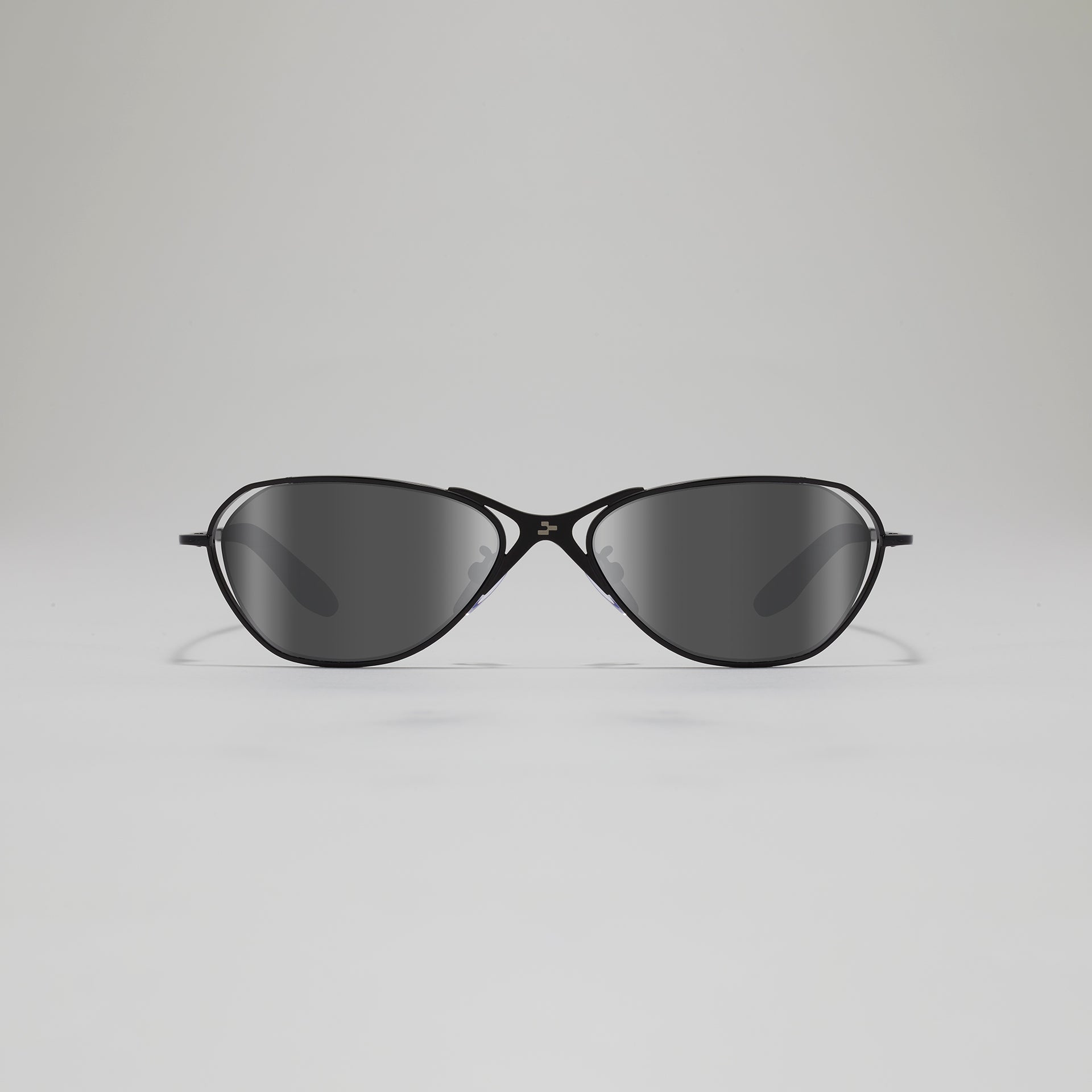 Black sunglasses on a light gray background