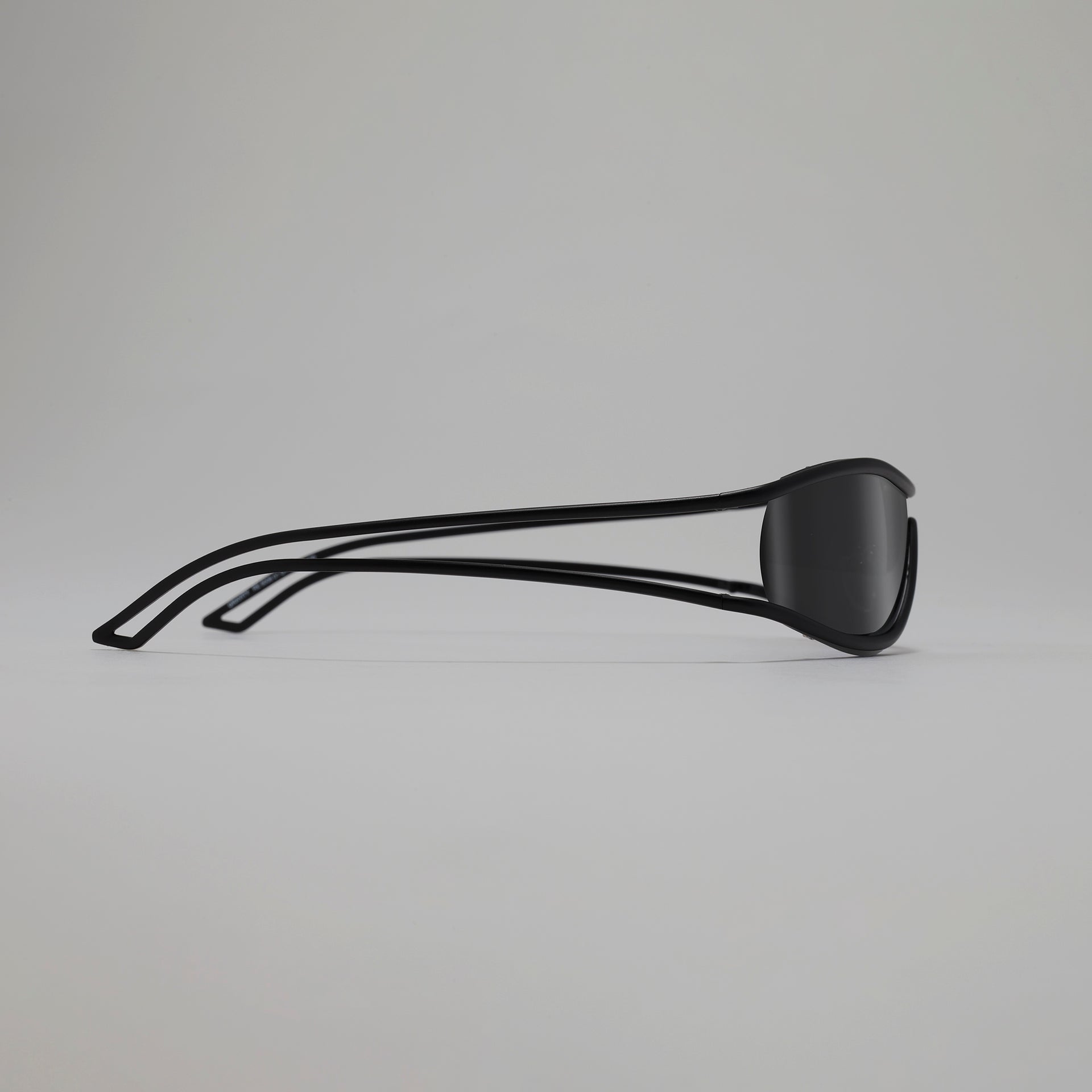 Black sunglasses on a gray background