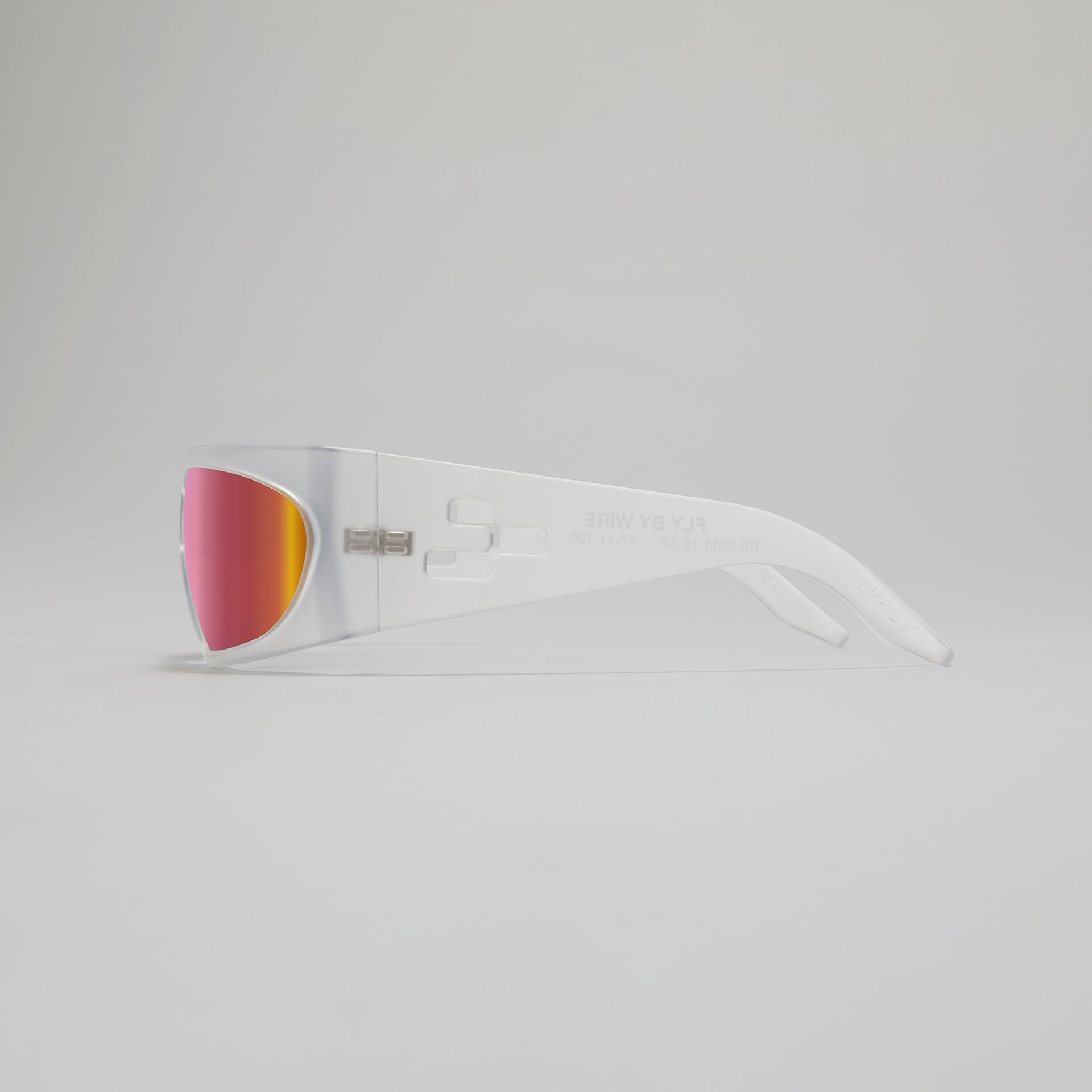 White sunglasses with red and yellow lenses on a light gray background