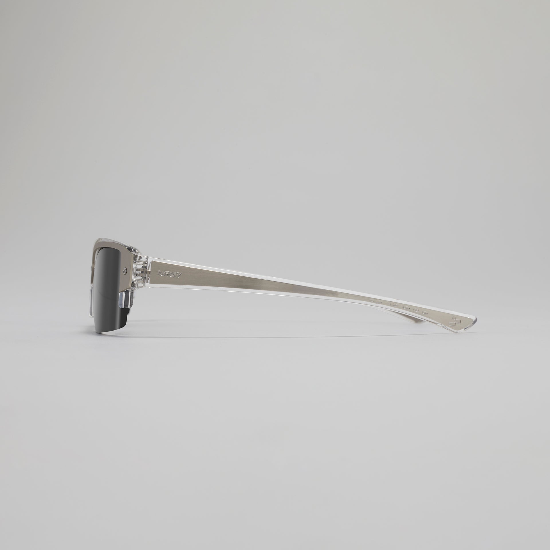 Silver safety razor on a gray background