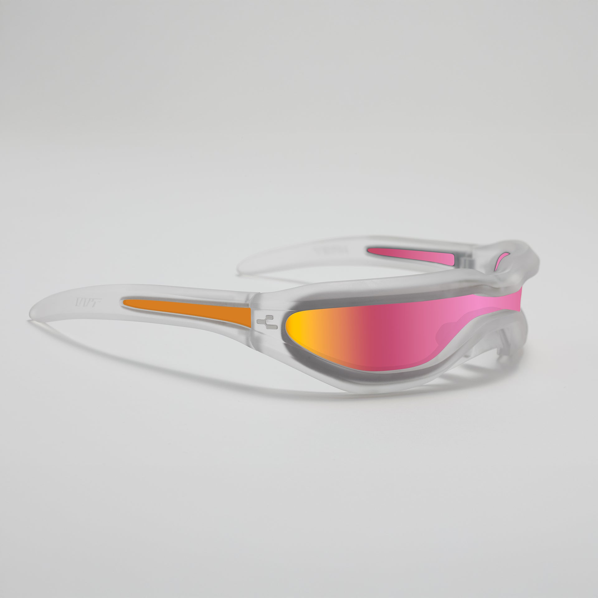 Sunglasses with clear frame and pink and orange lenses on a light gray background