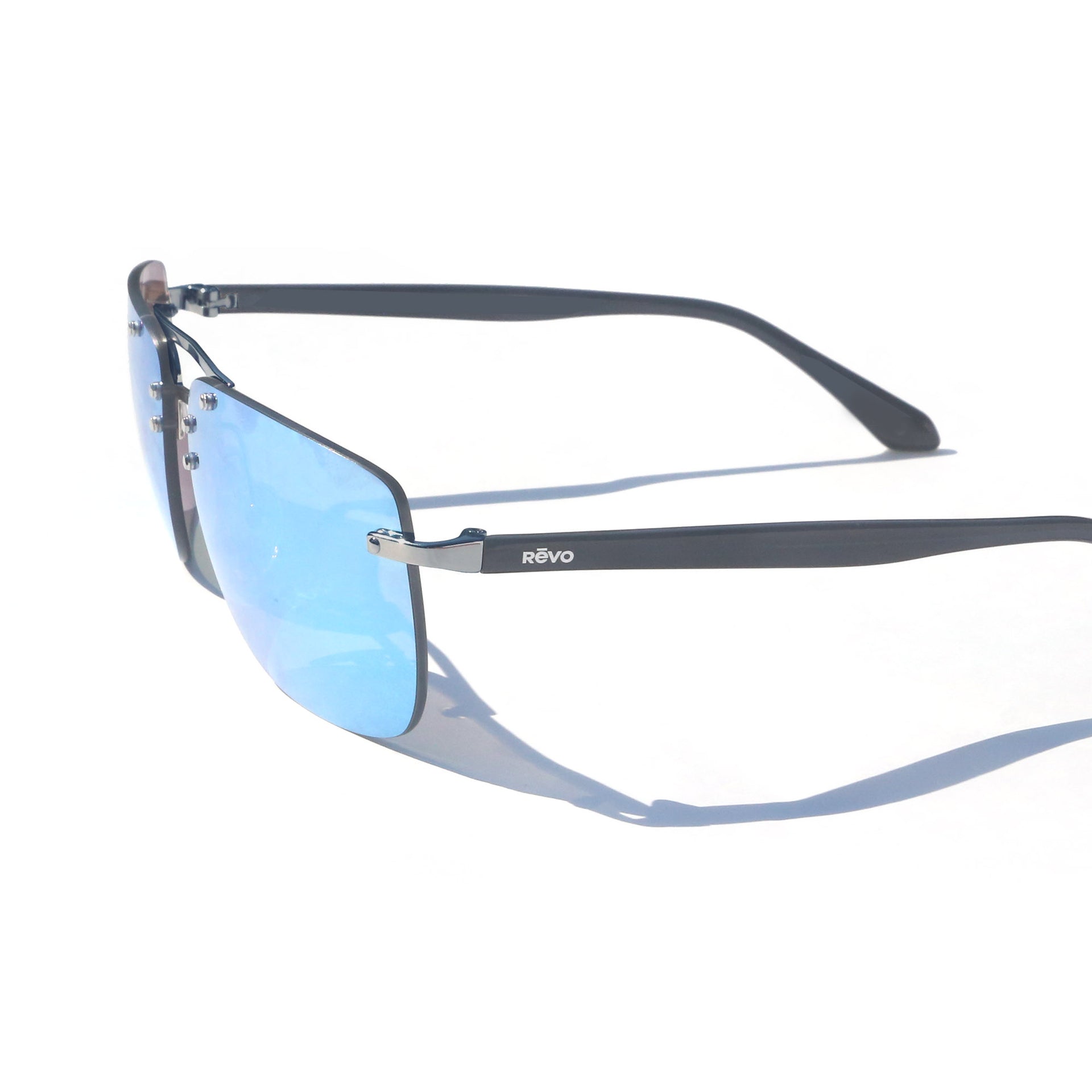 Sunglasses with blue lenses and black frame on a white background