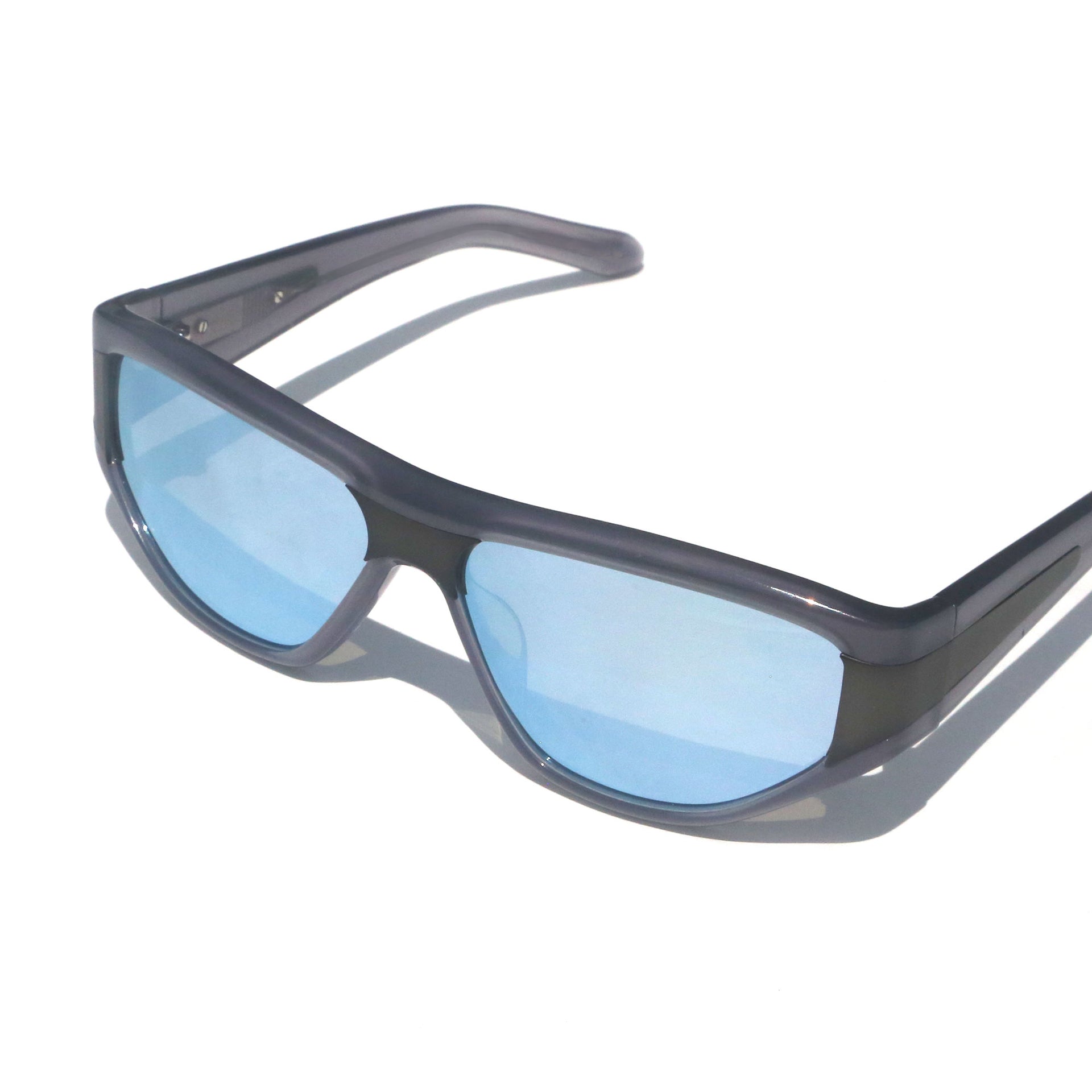 Sunglasses with blue lenses and gray frame on a white background