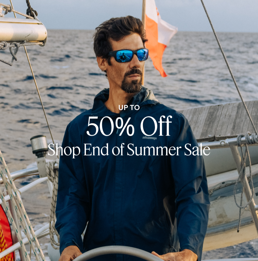 Man on a sailboat with promotional text overlay for an end of summer sale.