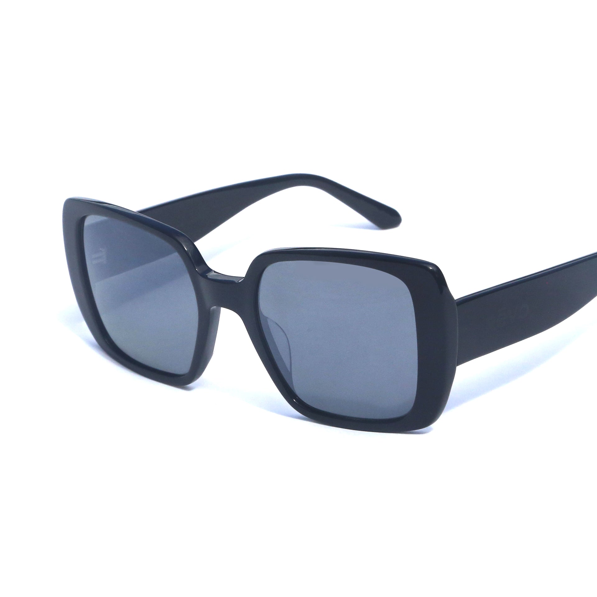 Black sunglasses with dark lenses on a white background