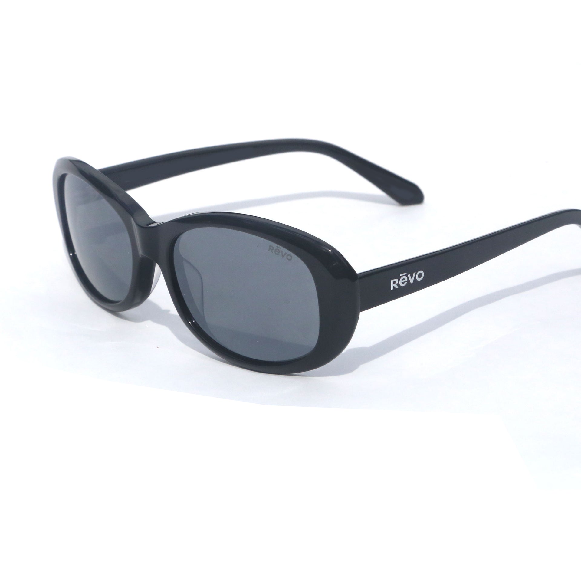 Black sunglasses with 'REVO' branding on a white background