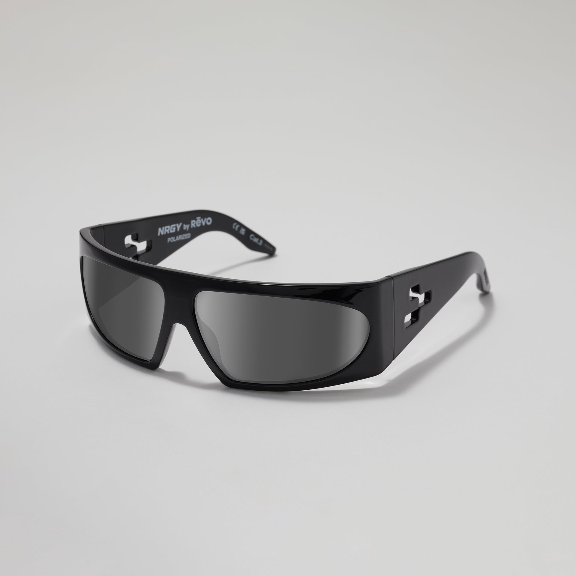 Black sunglasses with a brand logo on a gray background