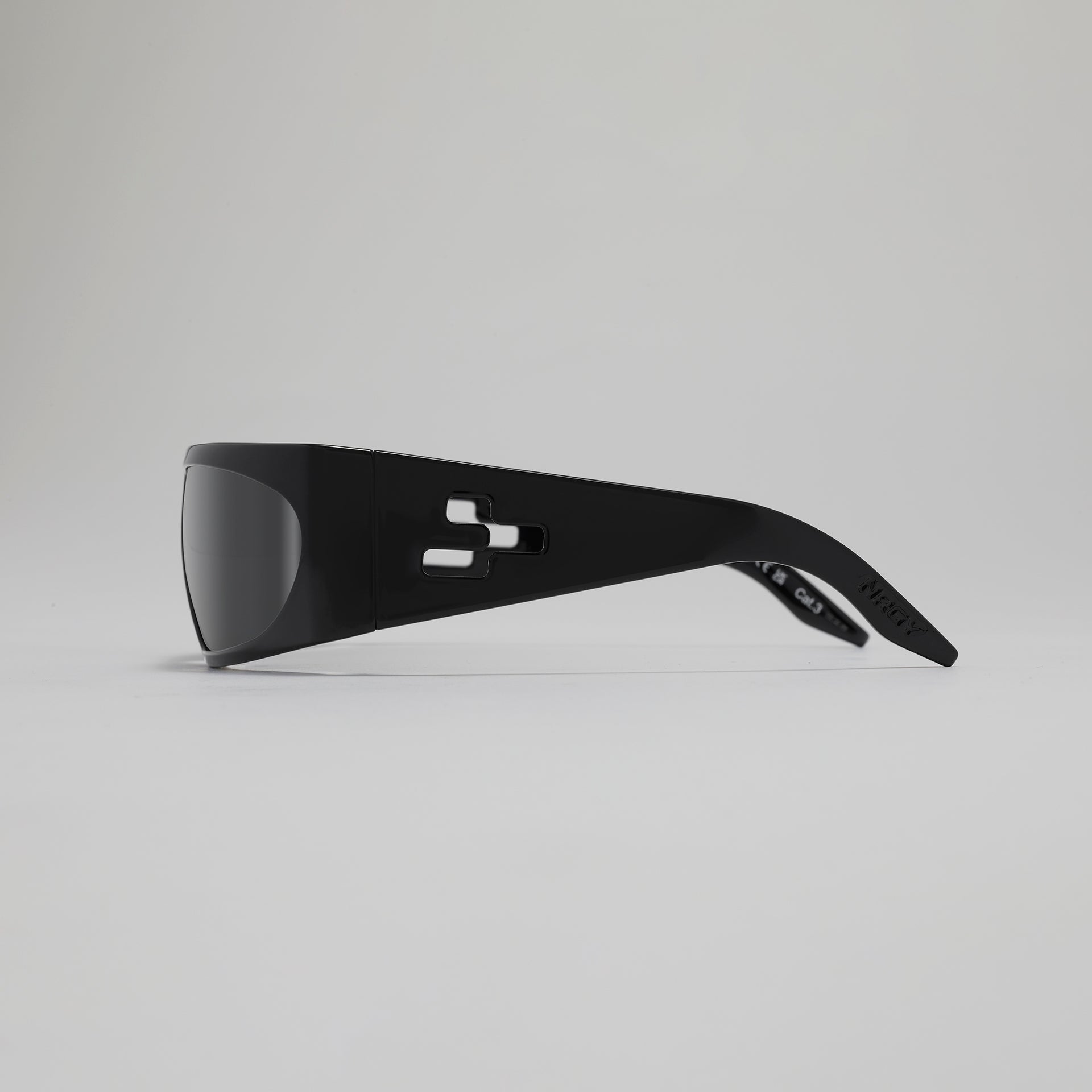 Black sunglasses on a light gray background