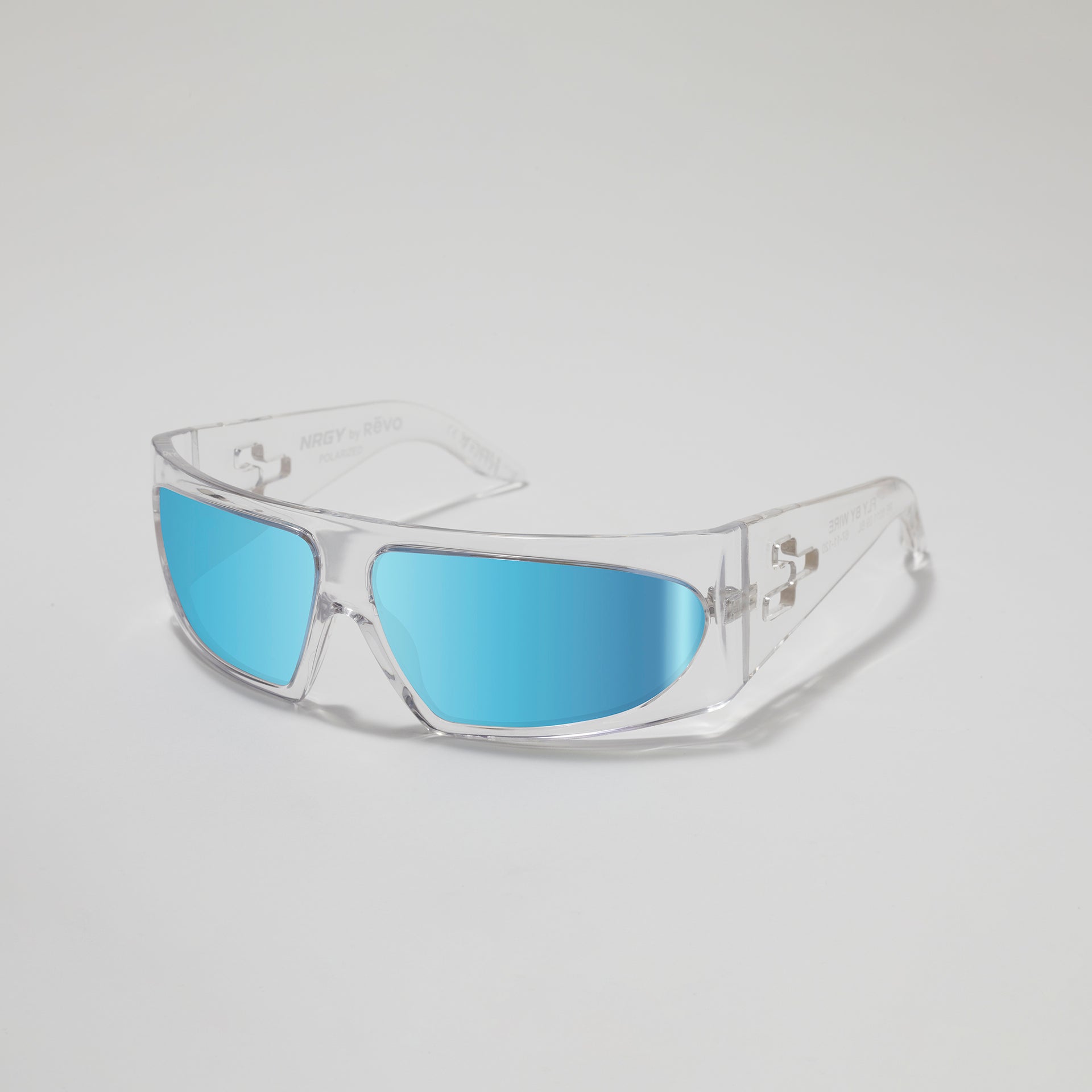 Clear-framed sunglasses with blue lenses on a light gray background