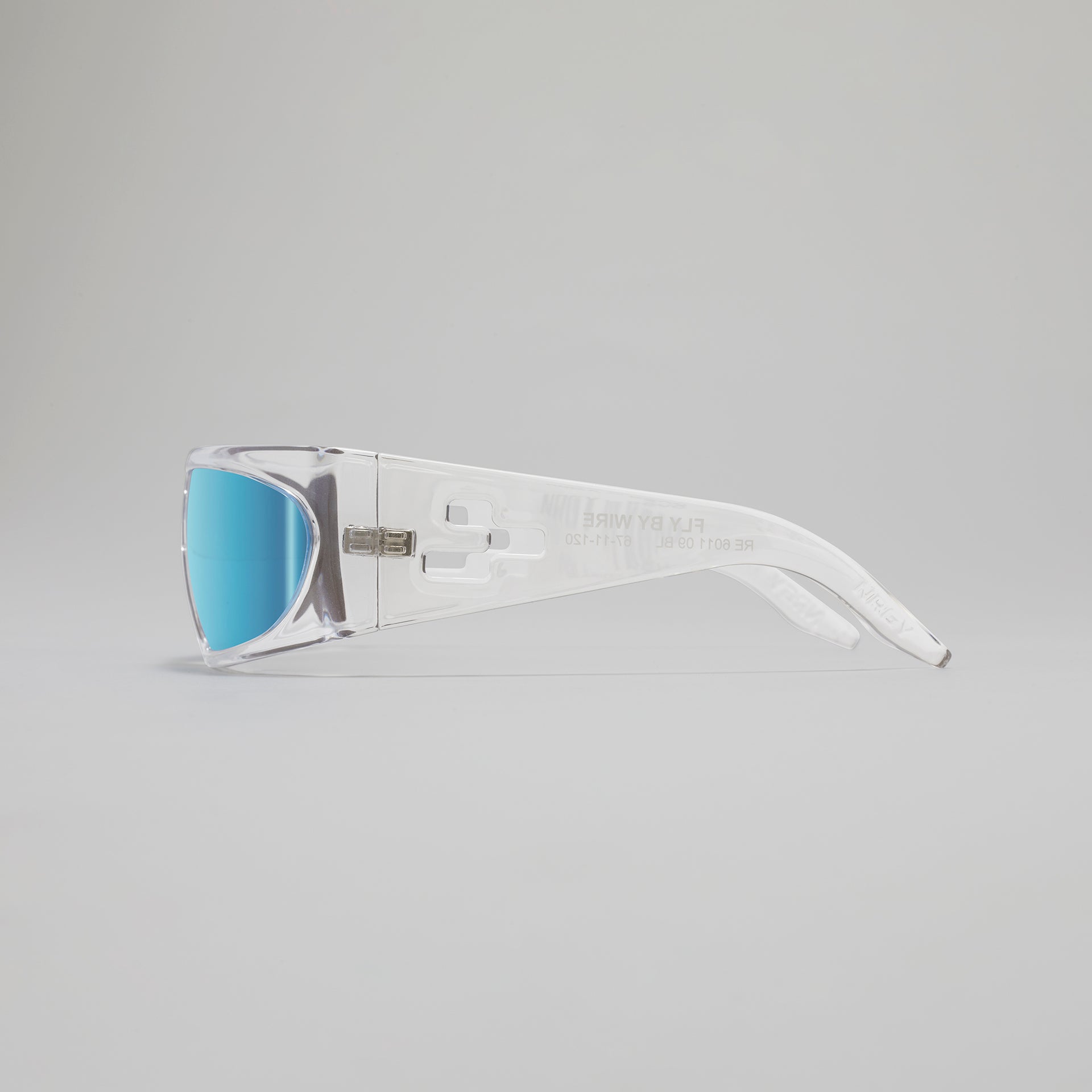 Sunglasses with blue lenses and white frame on a gray background