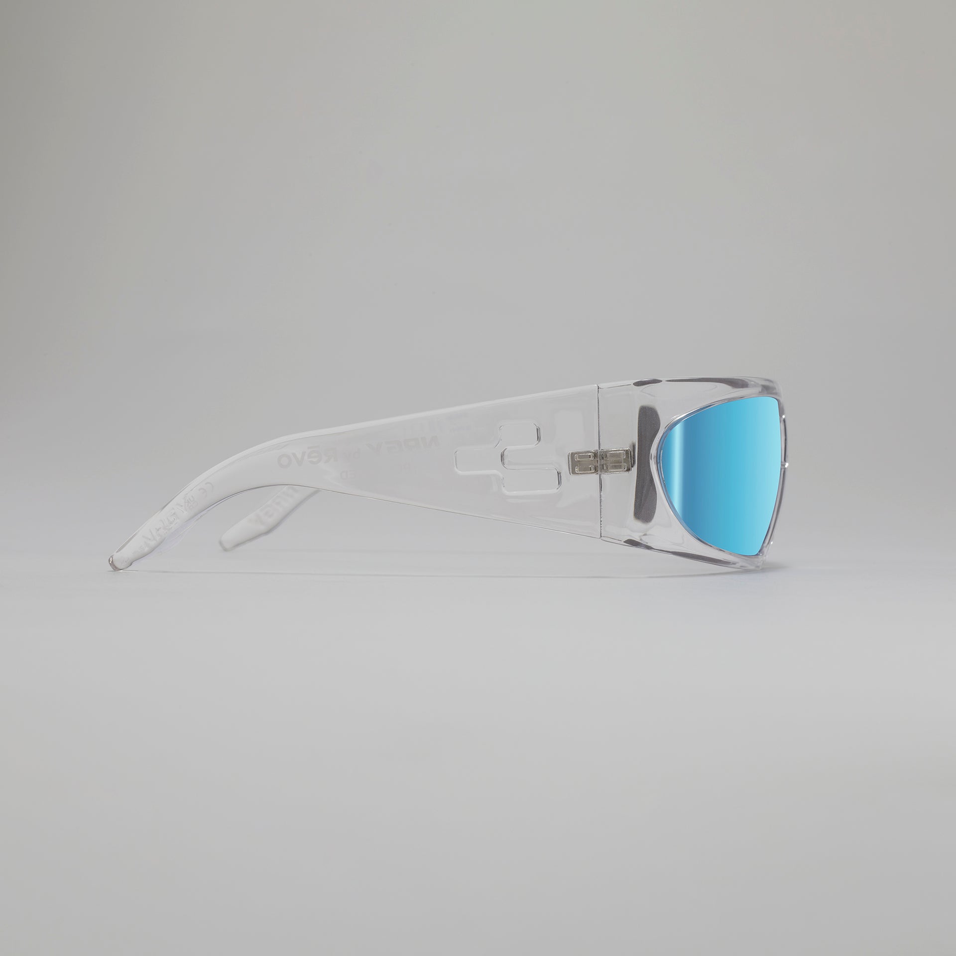 Sunglasses with white frame and blue lenses on a gray background