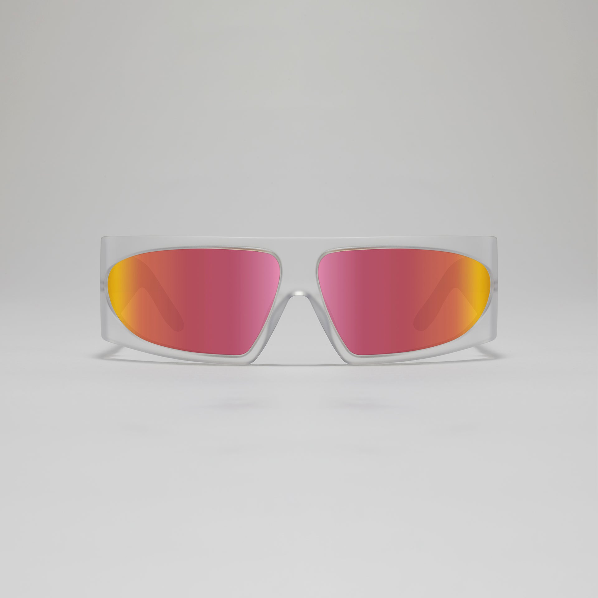 Sunglasses with clear frame and multicolored lenses on a light gray background
