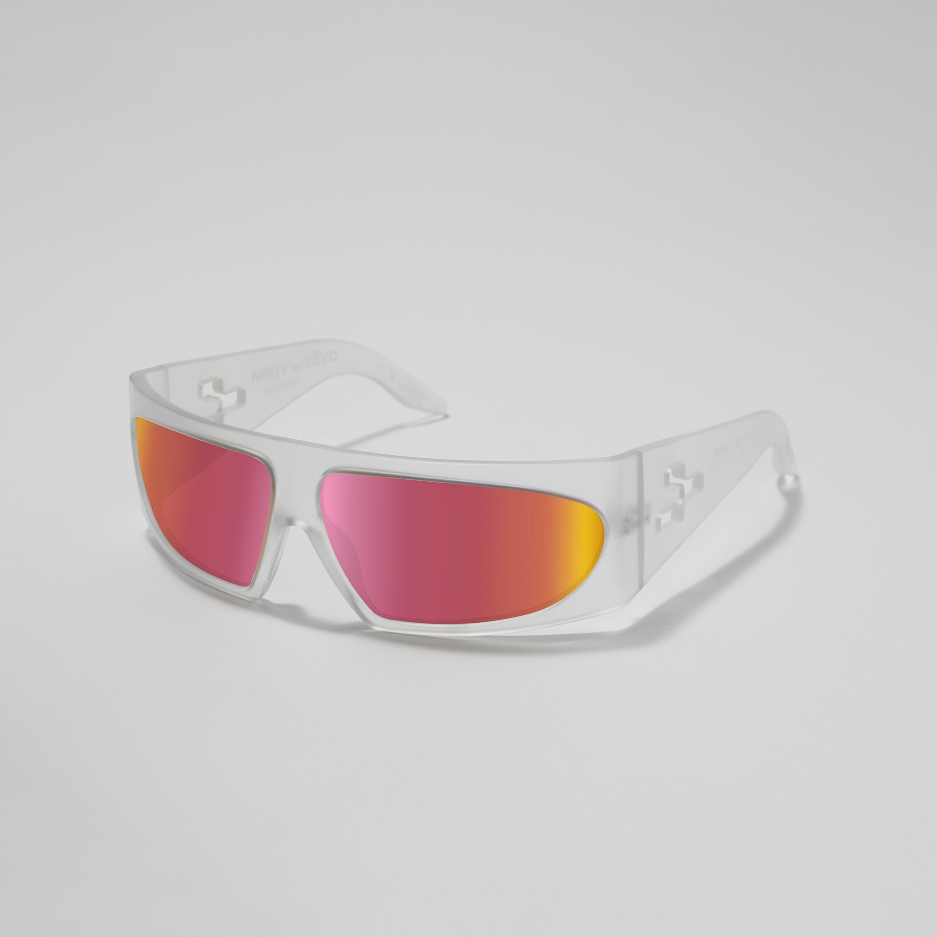 Sunglasses with red and yellow lenses on a light gray background