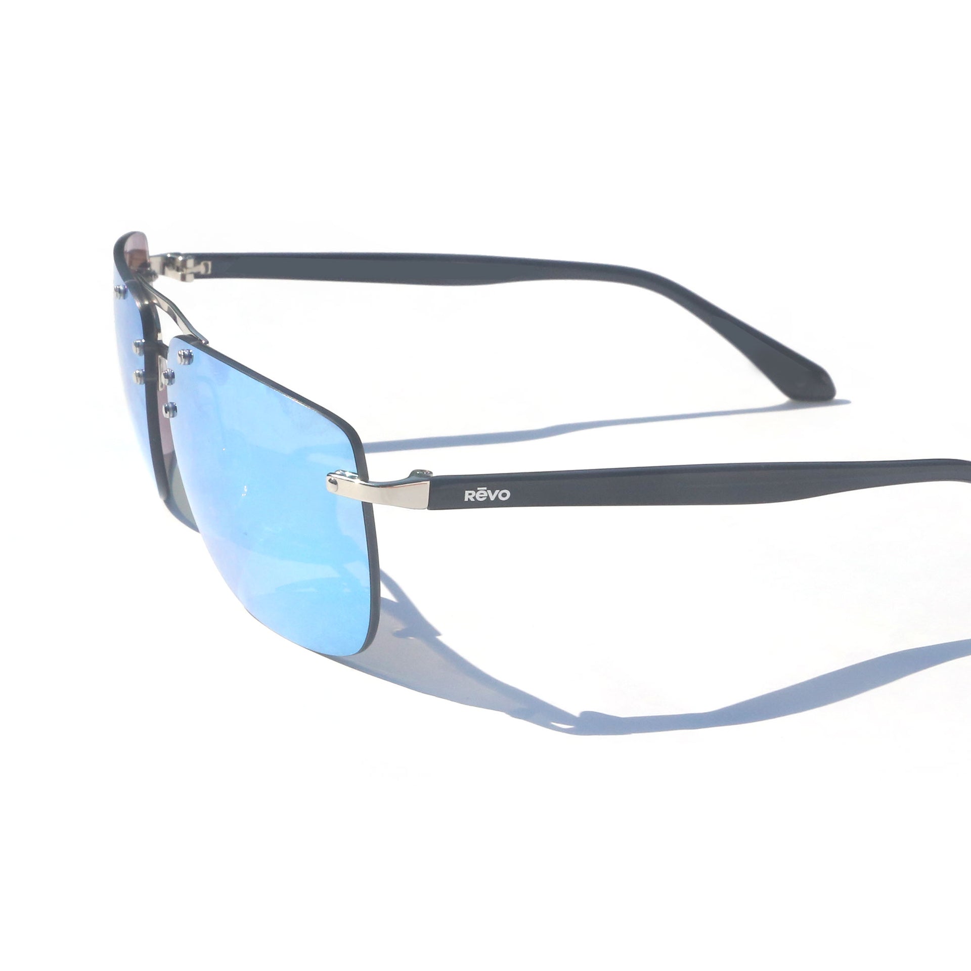 Sunglasses with blue lenses and black frames on a white background
